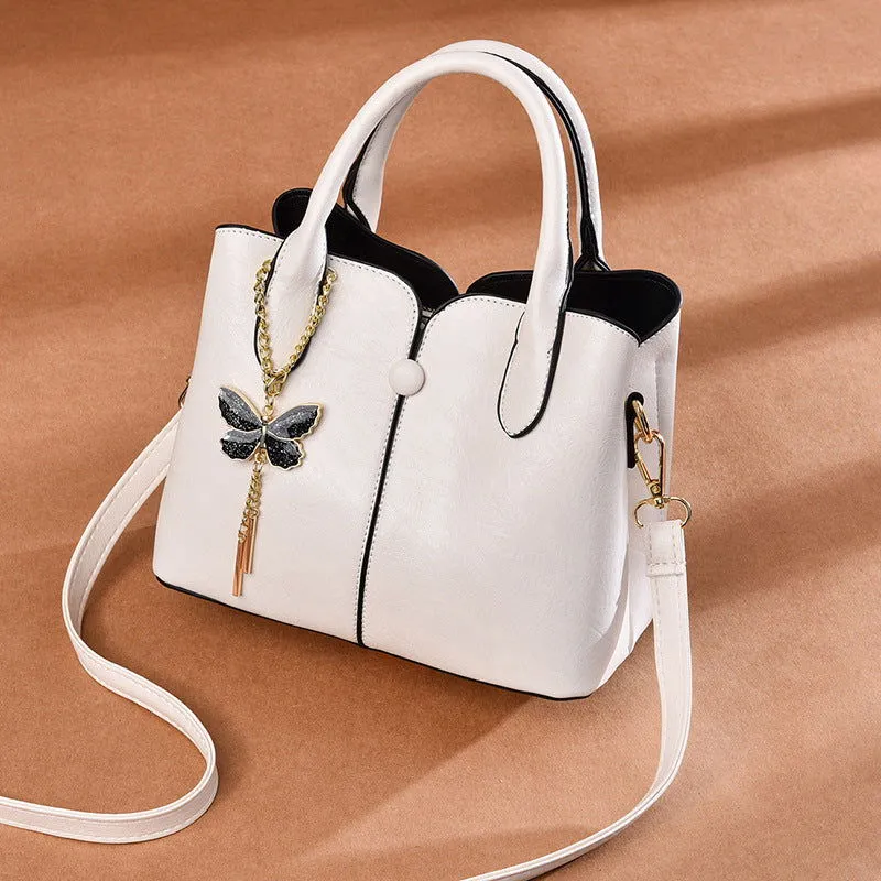 Butterfly Pendant Top Handle Satchel Leather Handbags