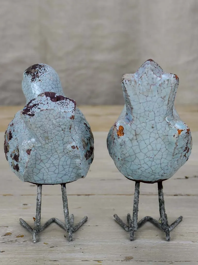 Two artisan made bird sculptures